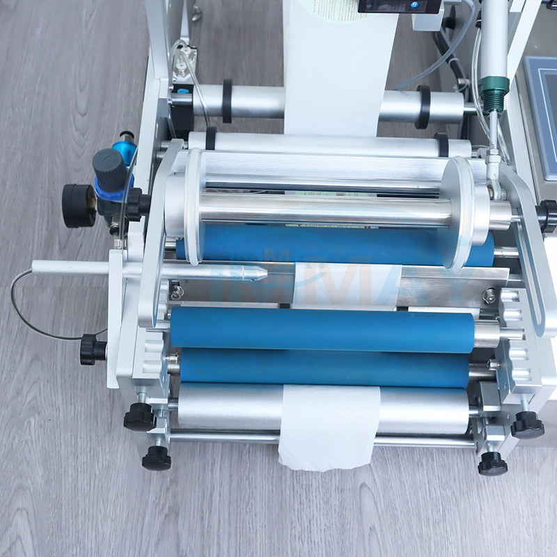 Fabricant d'&eacute;tiqueteuse de bouteilles rondes semi-automatique