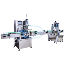 Machine de remplissage de bouteilles liquide &agrave; 4 becs 